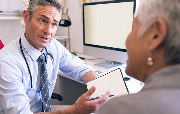 GP talking with patient