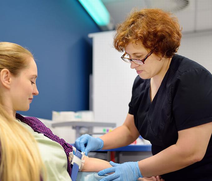 nurse taking bloods