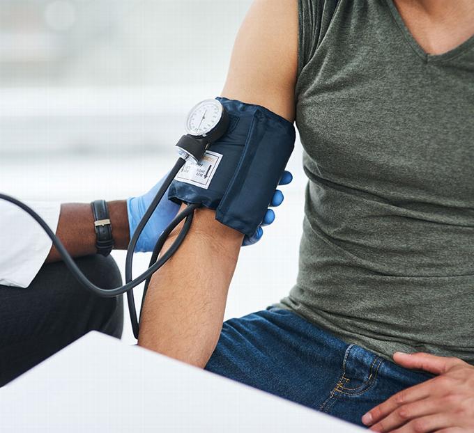 Blood pressure test at health screening
