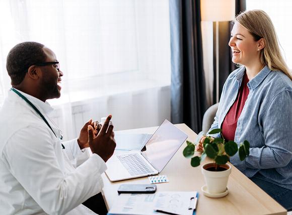 Doctor talking with patient