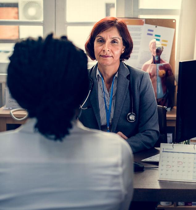 specialist in consultation with patient